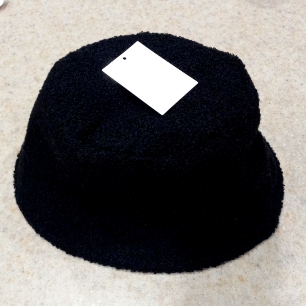 Black Bucket Bucle' Fabric hat. Worn once. Like new.